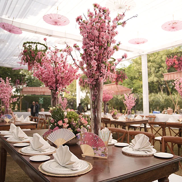 Luxurious wedding reception hall styled with elegant banquet seating and warm illumination